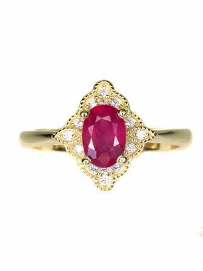 Stunning Natural 7x5mm Oval Ruby Zircon  accent in 14K Yellow GP Ring Size 6
